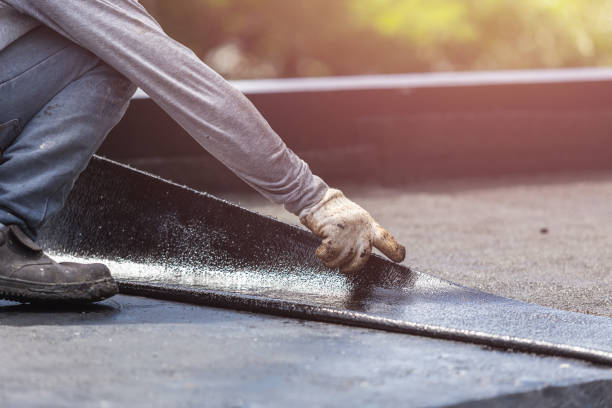 Professional Basement Waterproofing technician working in Arcade, GA